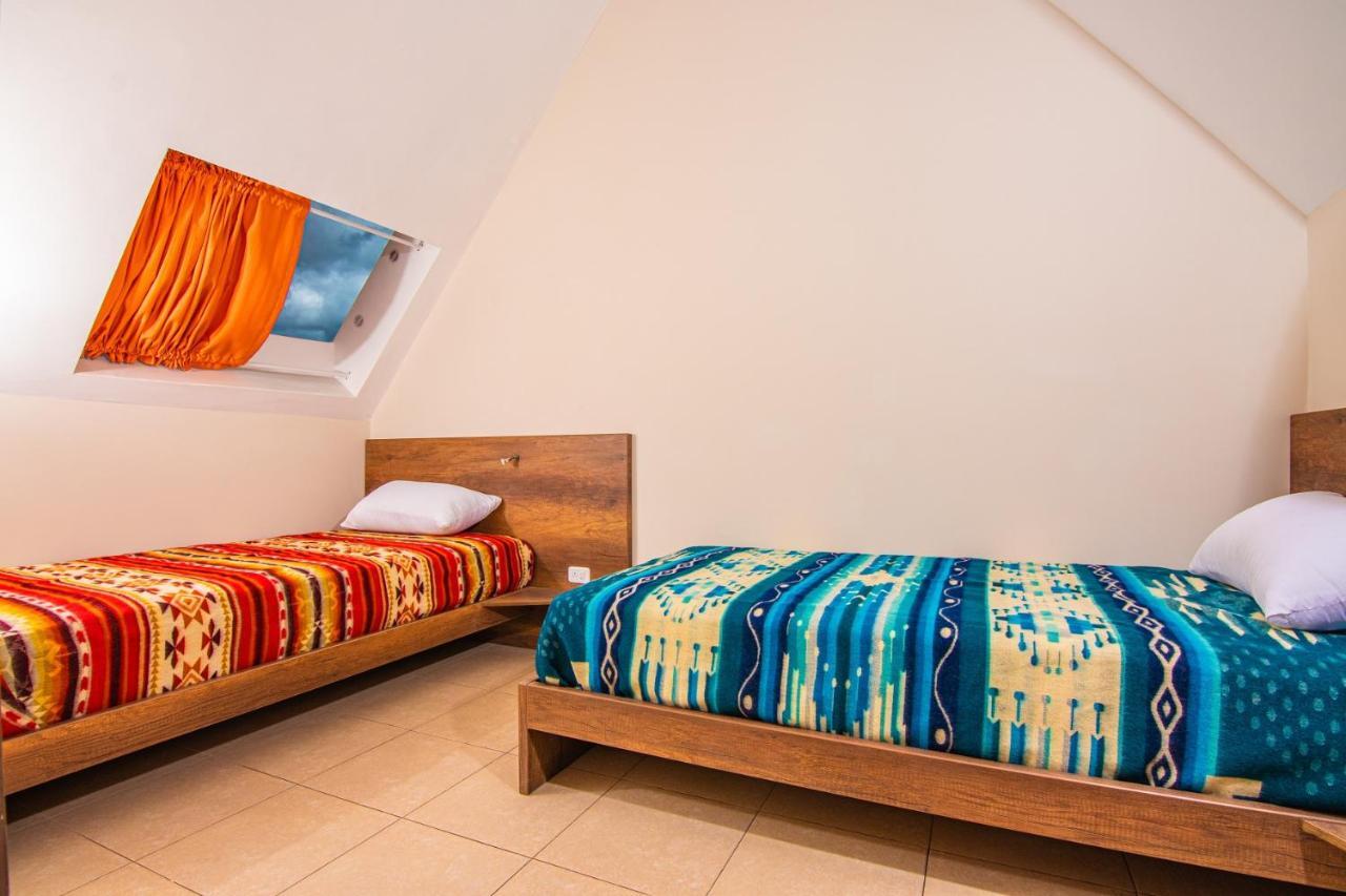 The Traveler Hostel โอตาวาโล ภายนอก รูปภาพ